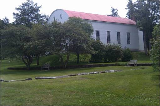 Shakers_12_LgWhiteBldgOvalRoof_fromDistance