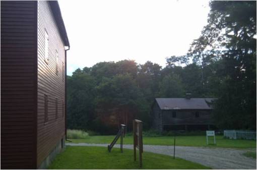 Shakers_17_SunsetViewalongRedBldgWall